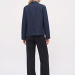 Dark indigo denim jacket, back view