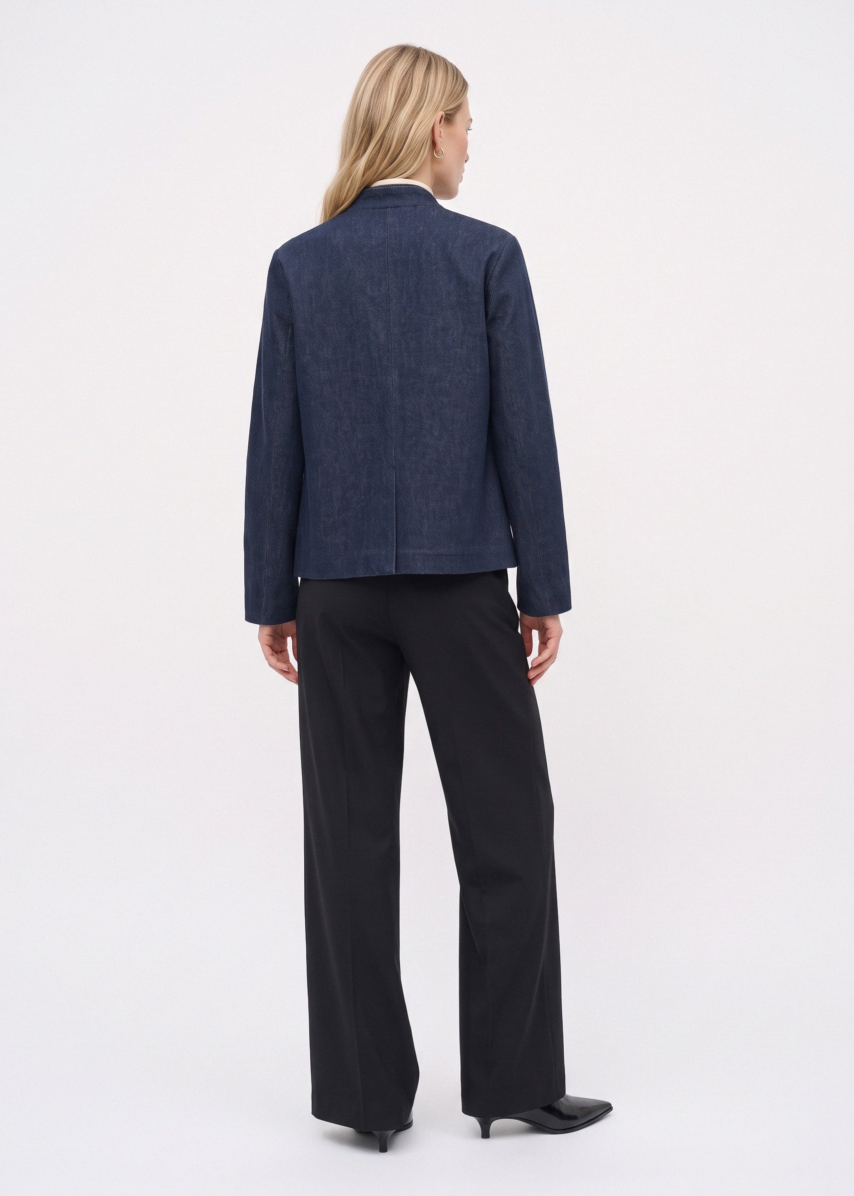 Dark indigo denim jacket, back view