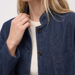 Denim jacket stand collar, buttons and chest pocket detail