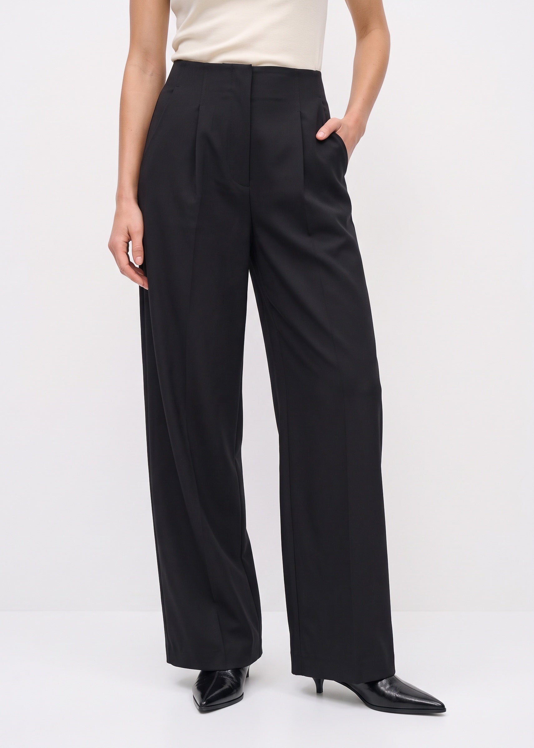Black pleated pants, front view