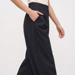 Black pants, front pleat and curved pocket detail