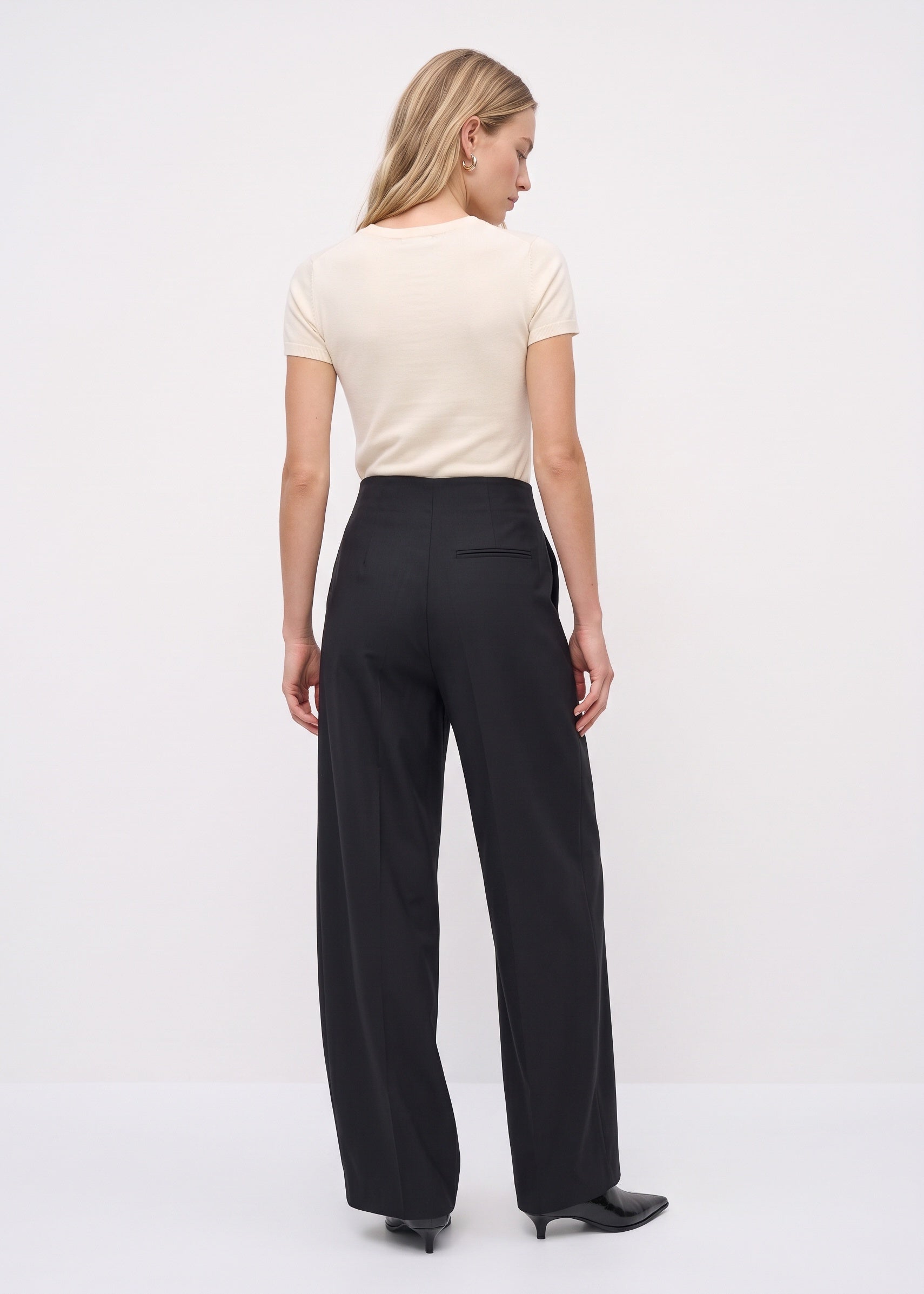 Black pants, full back view