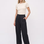 Black relaxed-leg pants, full front view