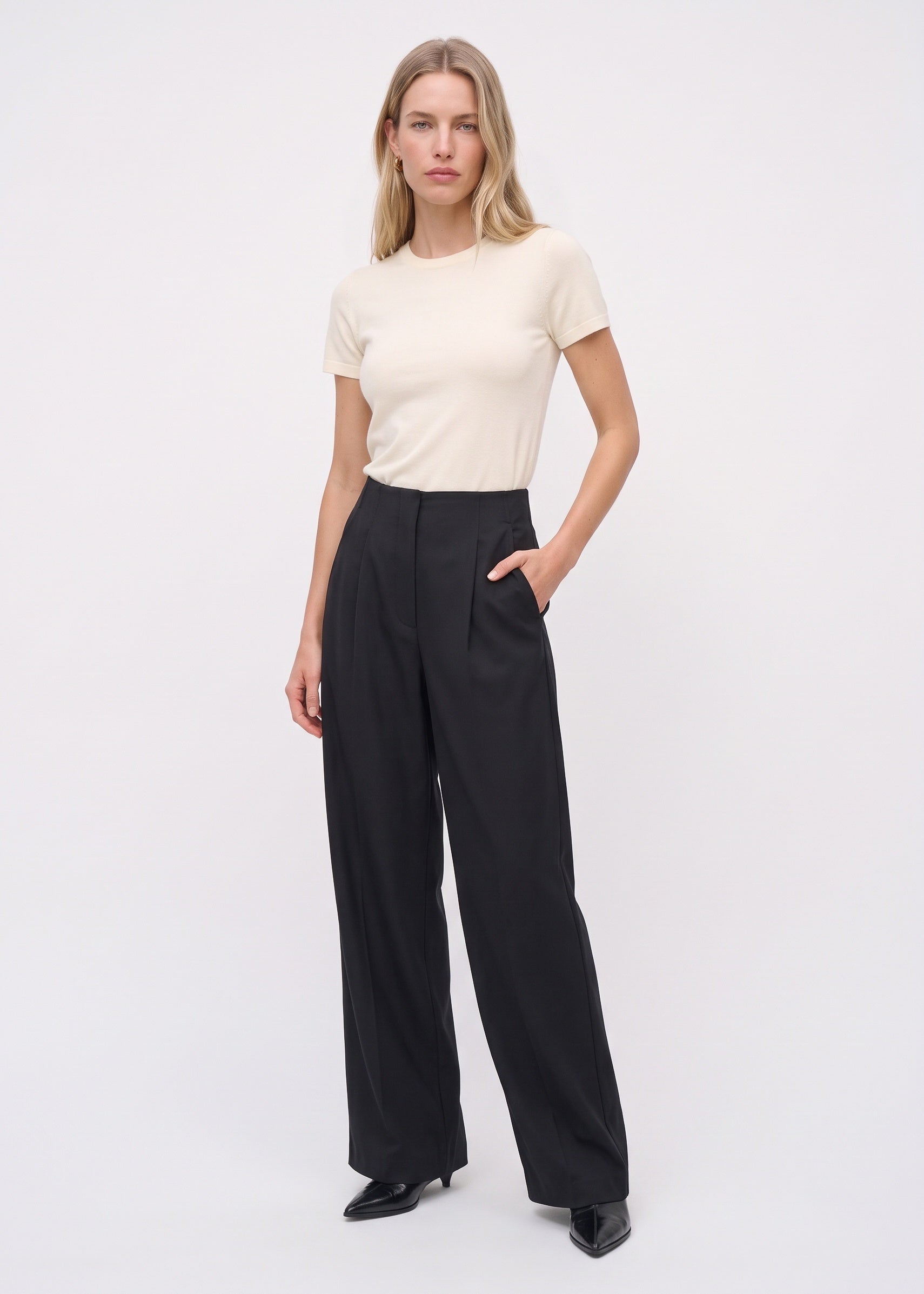Black relaxed-leg pants, full front view