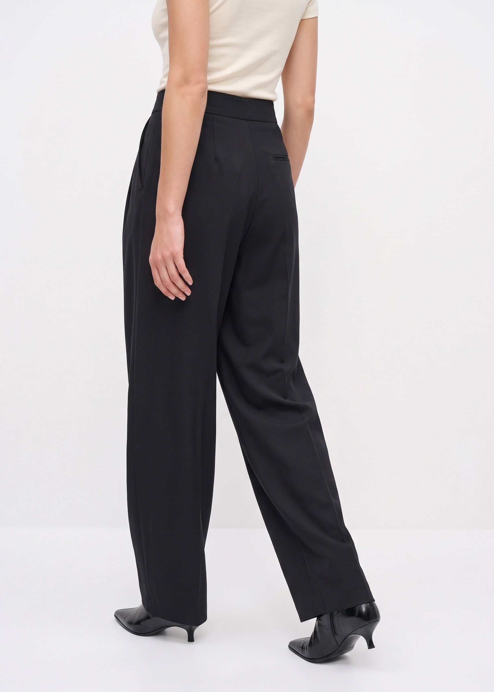 Black pants, walking side view