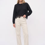 White corduroy pants with a straight leg, front view