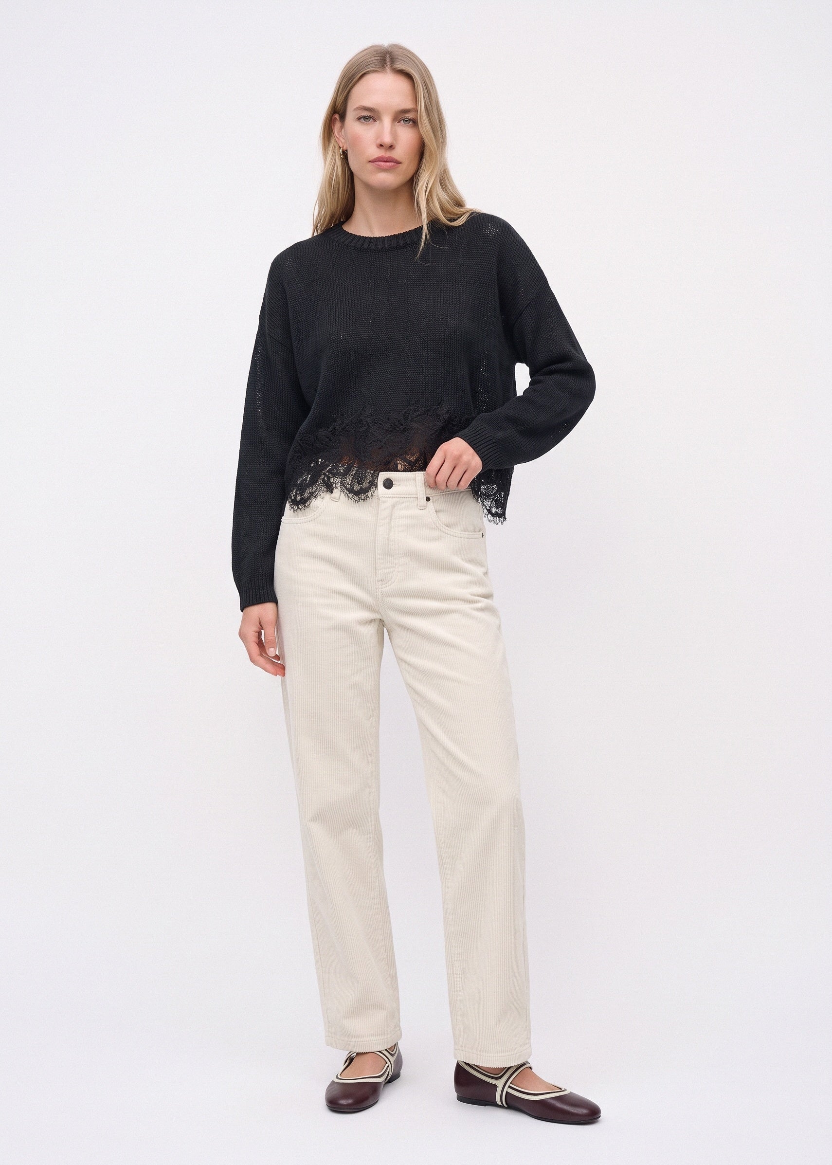 White corduroy pants with a straight leg, front view