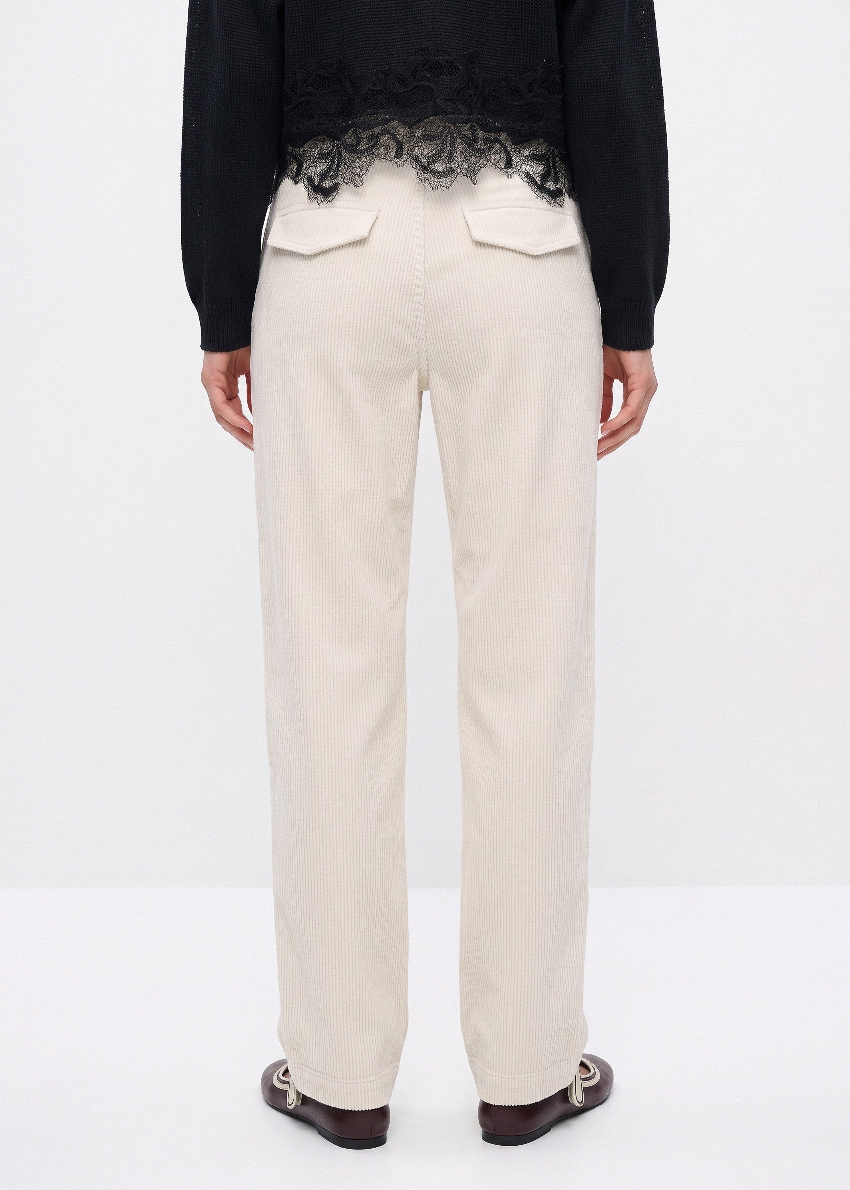 White corduroy pants with back flap pockets