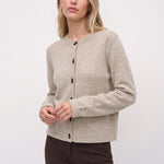 Beige merino cardigan, three-quarter front view