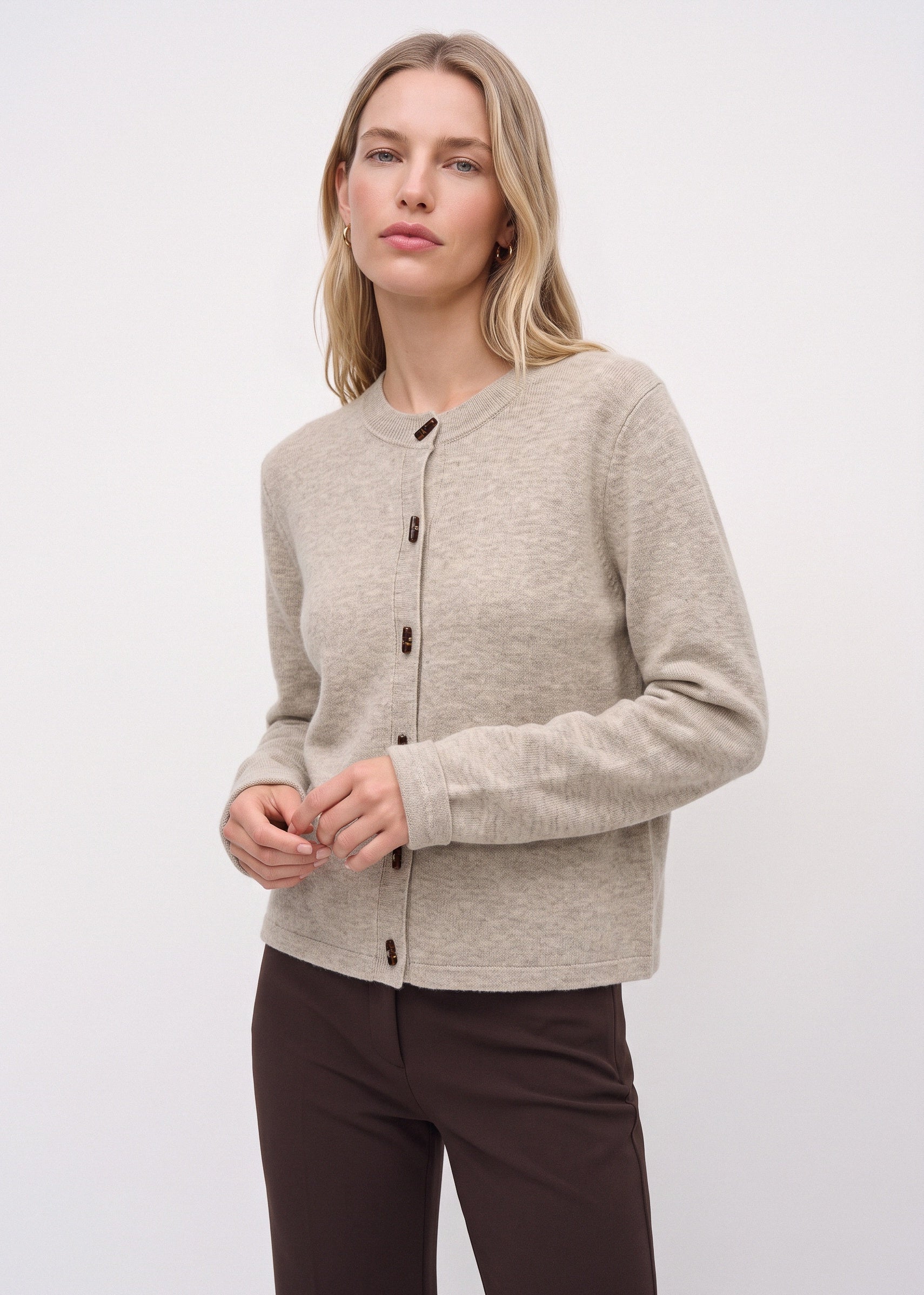 Beige merino cardigan, three-quarter front view
