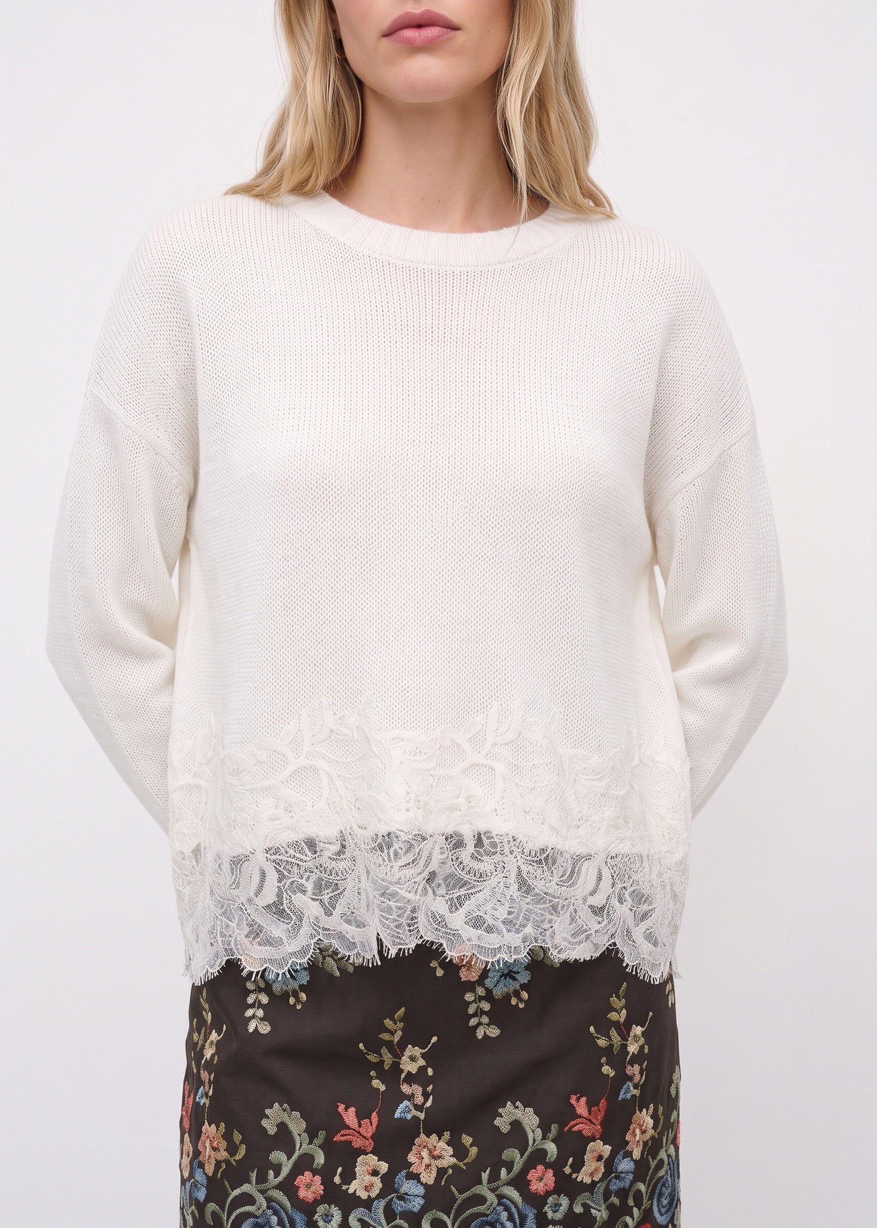 White sweater ribbed crew neck and floral lace detail